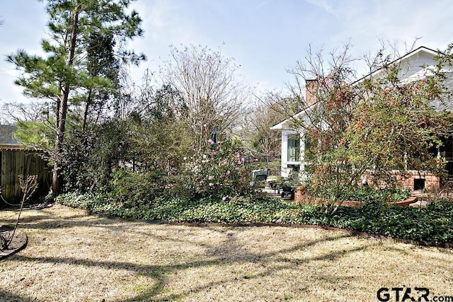 view of yard with fence