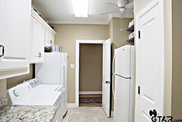 clothes washing area featuring light tile patterned floors, washer and dryer, crown molding, and a ceiling fan