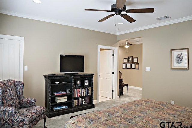 bedroom with visible vents, a ceiling fan, carpet, crown molding, and baseboards