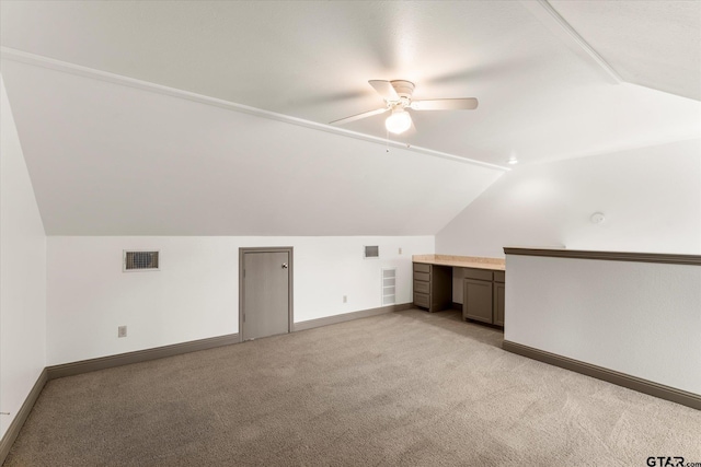 465 Cnty Rd Unit 1218, Pittsburg, TX 75686 - additional living space with lofted ceiling, a ceiling fan, light carpet, and baseboards