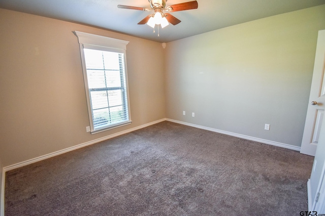 carpeted empty room with ceiling fan