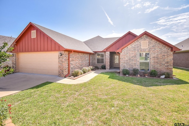 view of front of house with a garage and a front lawn