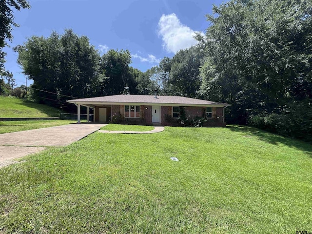 117 Harvey St, Rusk, TX 75785 - ranch-style home featuring driveway, a carport, a front lawn, and brick siding