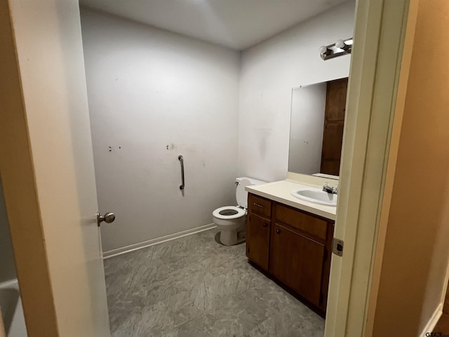 117 Harvey St, Rusk, TX 75785 - bathroom featuring vanity and toilet