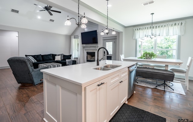 15348 C R 169, Tyler, TX 75703 - kitchen with a center island with sink, ceiling fan, a fireplace, dark wood-style flooring, and lofted ceiling