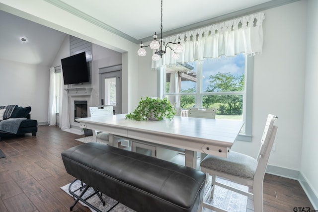 15348 C R 169, Tyler, TX 75703 - dining room featuring a fireplace with flush hearth, dark wood-style floors, crown molding, and a chandelier