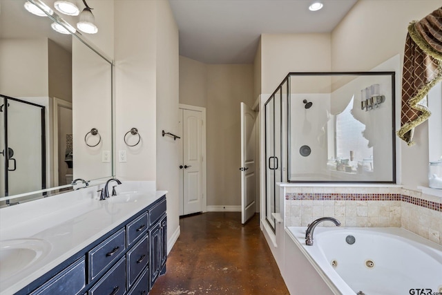 bathroom featuring concrete flooring, vanity, and separate shower and tub