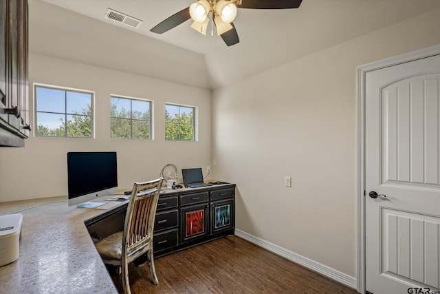 home office featuring lofted ceiling, ceiling fan, a healthy amount of sunlight, and dark hardwood / wood-style flooring