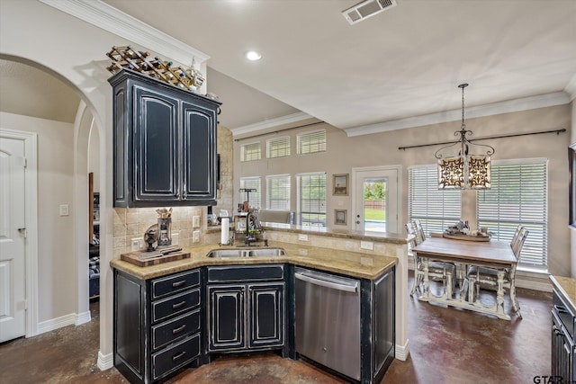 kitchen with sink, kitchen peninsula, decorative light fixtures, stainless steel dishwasher, and decorative backsplash