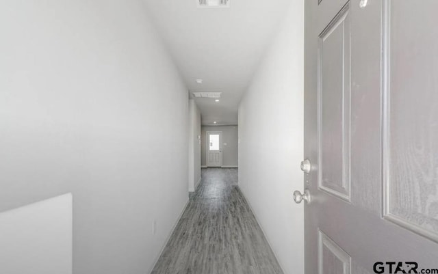 208 Parker Oaks Dr, Chandler, TX 75758 - corridor with wood finished floors