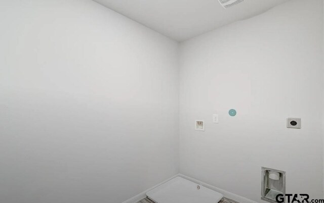 208 Parker Oaks Dr, Chandler, TX 75758 - laundry area featuring hookup for an electric dryer, baseboards, and hookup for a washing machine