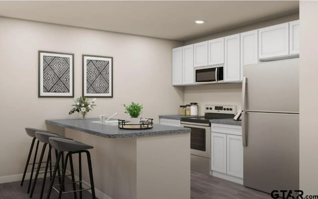 208 Parker Oaks Dr, Chandler, TX 75758 - kitchen featuring appliances with stainless steel finishes, dark countertops, a breakfast bar, white cabinets, and recessed lighting