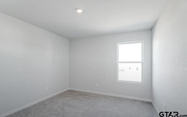 208 Parker Oaks Dr, Chandler, TX 75758 - spare room featuring light colored carpet and baseboards