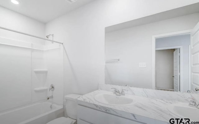 208 Parker Oaks Dr, Chandler, TX 75758 - bathroom featuring double vanity, bathing tub / shower combination, and toilet