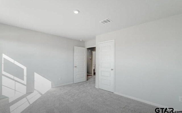 208 Parker Oaks Dr, Chandler, TX 75758 - carpeted empty room with baseboards and recessed lighting