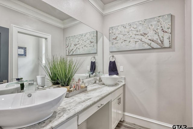 113 Stuart St, Arp, TX 75750 - full bathroom with double vanity, crown molding, and wood finished floors