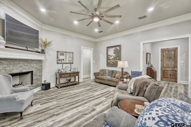 113 Stuart St, Arp, TX 75750 - living room with ceiling fan, wood finished floors, crown molding, a fireplace, and recessed lighting