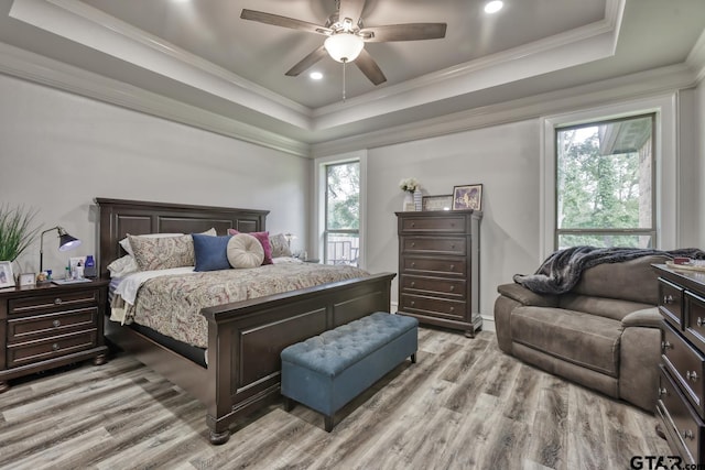 113 Stuart St, Arp, TX 75750 - bedroom with light wood-style flooring, a raised ceiling, crown molding, recessed lighting, and a ceiling fan