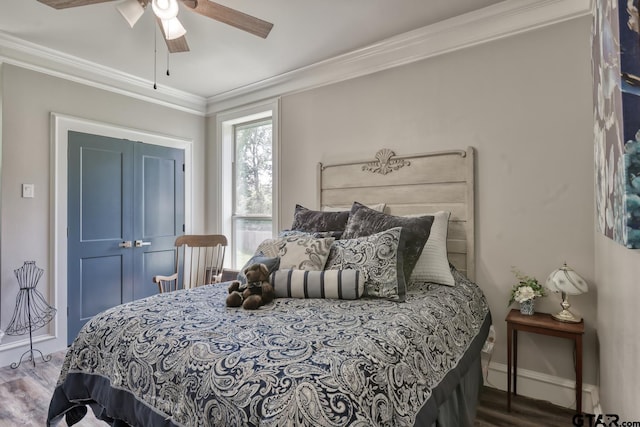 113 Stuart St, Arp, TX 75750 - bedroom featuring crown molding, wood finished floors, and ceiling fan