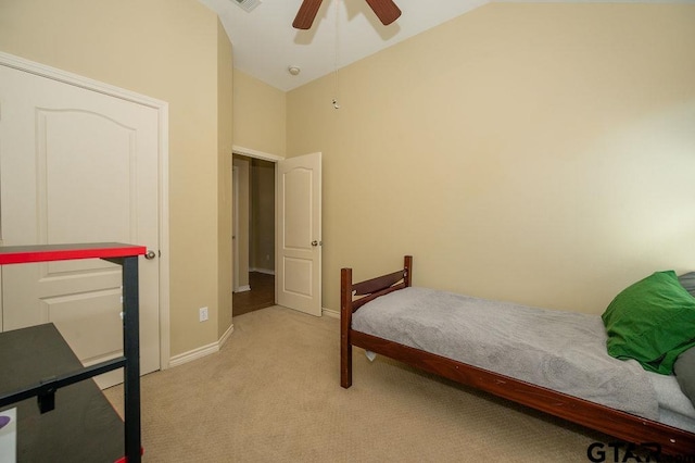 bedroom featuring ceiling fan and light colored carpet