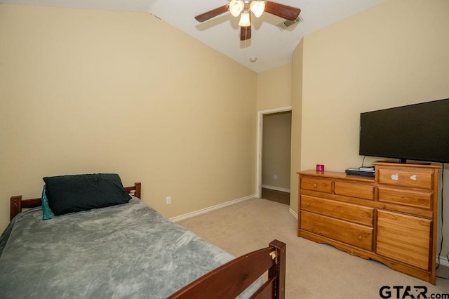 carpeted bedroom featuring ceiling fan and lofted ceiling