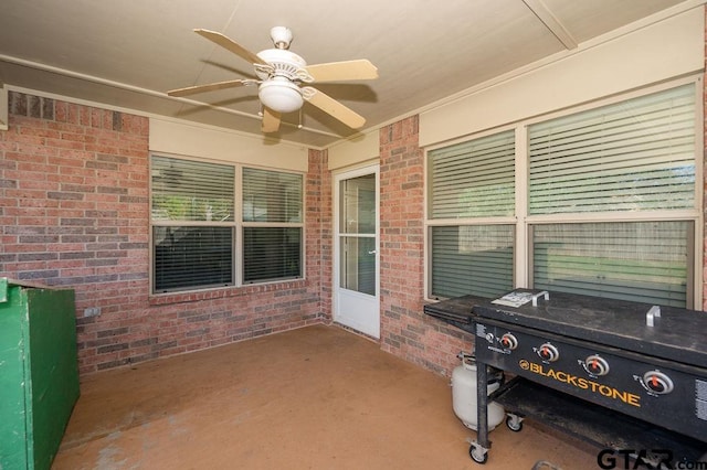 view of patio featuring ceiling fan