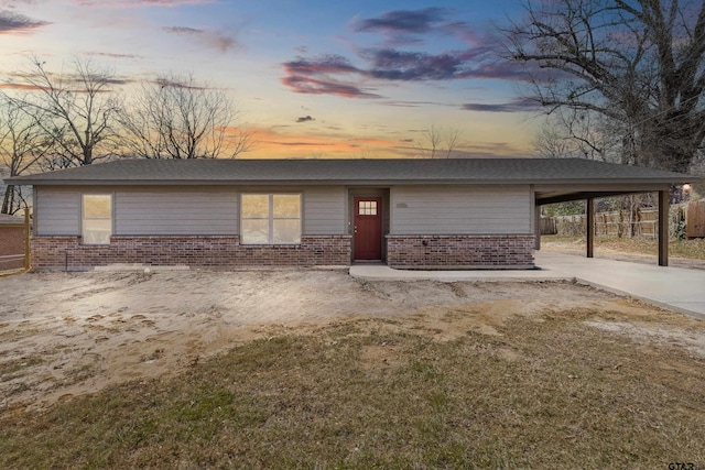 view of front of property with a carport