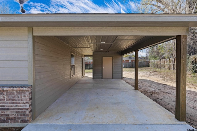 view of patio featuring a carport