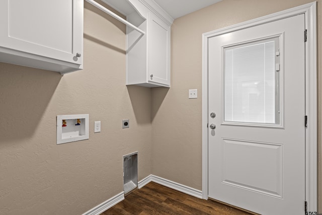clothes washing area with dark wood-style floors, hookup for an electric dryer, baseboards, hookup for a washing machine, and cabinet space