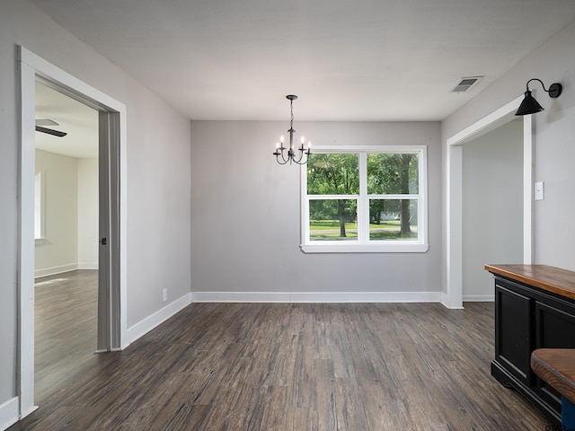 501 S Railroad St, Troup, TX 75789 - unfurnished dining area featuring dark wood-type flooring and a chandelier