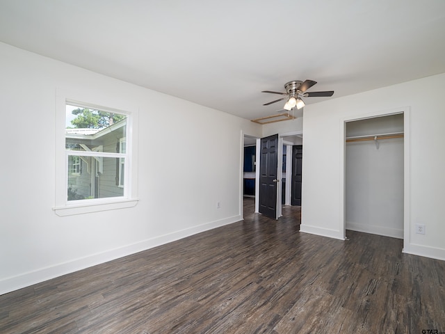 501 S Railroad St, Troup, TX 75789 - unfurnished bedroom with dark wood finished floors, a closet, and ceiling fan