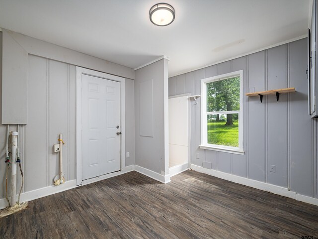 501 S Railroad St, Troup, TX 75789 - entryway with a decorative wall and dark wood-style flooring