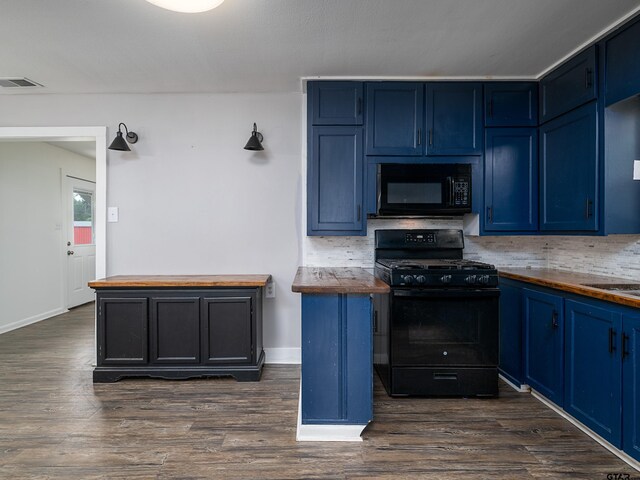 501 S Railroad St, Troup, TX 75789 - kitchen with black appliances, blue cabinetry, wood counters, and tasteful backsplash
