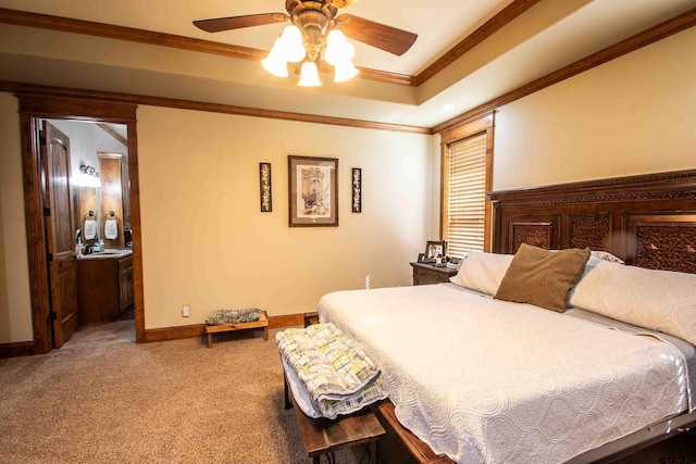 14647 County Road 2337, Tyler, TX 75707 - carpeted bedroom featuring crown molding, ceiling fan, a tray ceiling, a sink, and baseboards
