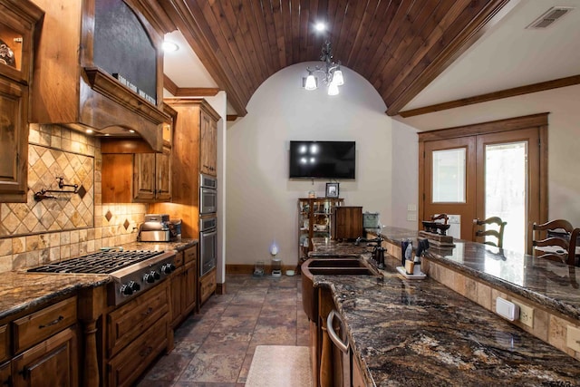 14647 County Road 2337, Tyler, TX 75707 - kitchen featuring vaulted ceiling, wooden ceiling, a sink, stainless steel appliances, and baseboards