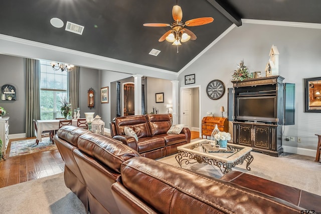 living room featuring baseboards, lofted ceiling with beams, ornate columns, and visible vents
