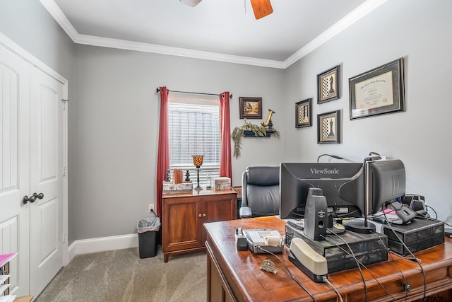 home office with a ceiling fan, carpet flooring, crown molding, and baseboards