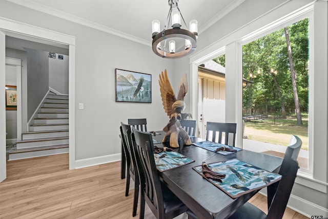 14607 Reserve Ct, Tyler, TX 75707 - dining space with a chandelier, light wood finished floors, ornamental molding, and stairway