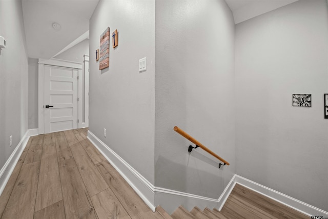 14607 Reserve Ct, Tyler, TX 75707 - corridor featuring wood finished floors and an upstairs landing