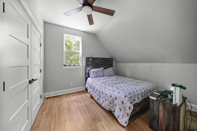 14607 Reserve Ct, Tyler, TX 75707 - bedroom with light wood-type flooring, vaulted ceiling, and ceiling fan