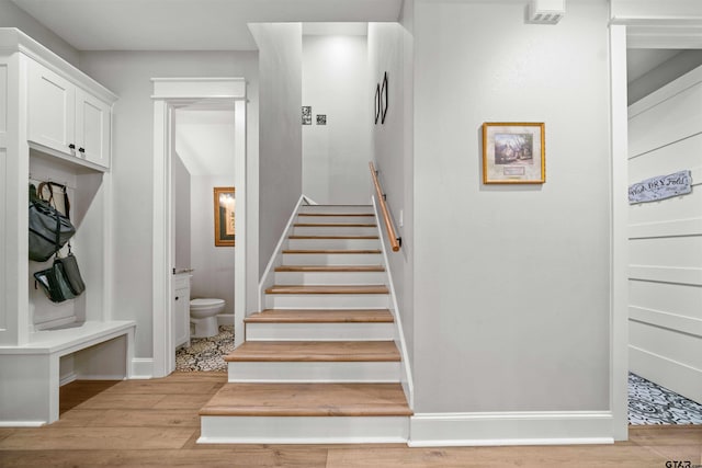 14607 Reserve Ct, Tyler, TX 75707 - stairway with wood finished floors and baseboards