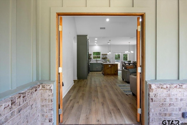 doorway to property featuring visible vents