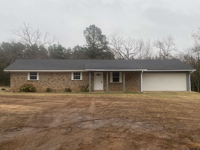 single story home with a garage