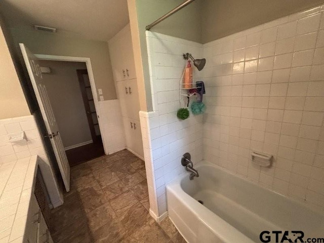3010 Cook Ln, Longview, TX 75602 - full bathroom featuring shower / washtub combination and wainscoting