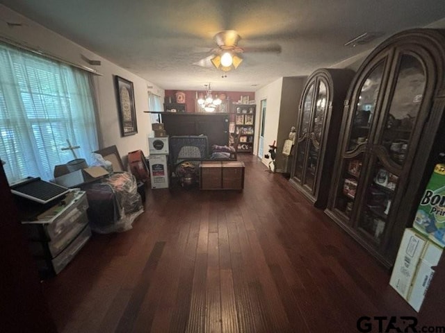 3010 Cook Ln, Longview, TX 75602 - living room featuring hardwood / wood-style floors, a chandelier, and a ceiling fan