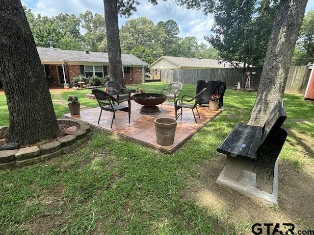 3010 Cook Ln, Longview, TX 75602 - view of yard with a fire pit and a patio area