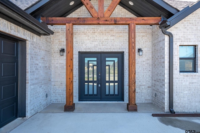 doorway to property featuring french doors