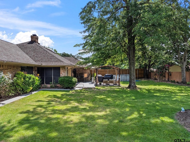1801 N Fairway, Mount Pleasant, TX 75455 - fenced backyard featuring a patio area