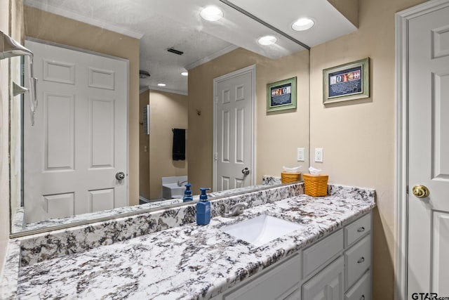 1801 N Fairway, Mount Pleasant, TX 75455 - bathroom with vanity, crown molding, and recessed lighting