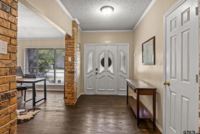 1801 N Fairway, Mount Pleasant, TX 75455 - entryway featuring a textured ceiling, dark wood finished floors, and crown molding